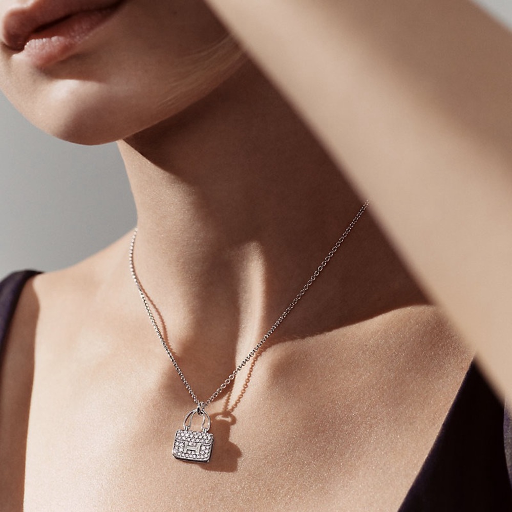 Hermes Amulettes Constance pendant necklace
